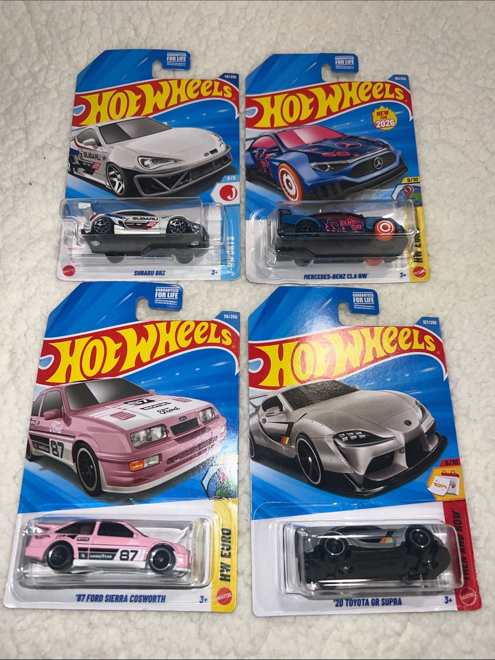 4 Hot Wheels by Mattel